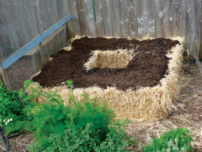 hay bales and compost