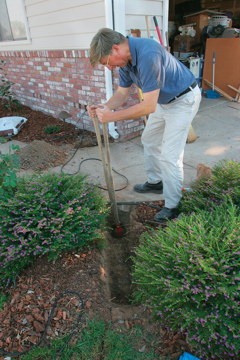 irrigation piping 18 inches belowground along pathways and near bed edges