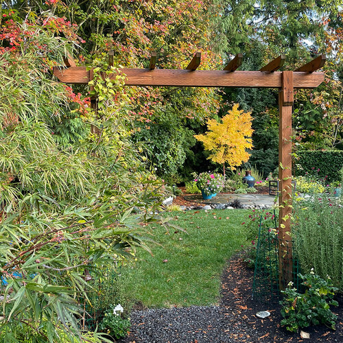 fall garden through arbor