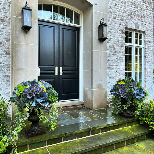 blue and green containers that match the entryway