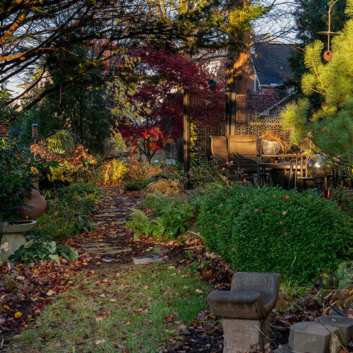 garden path leading to patio seating area