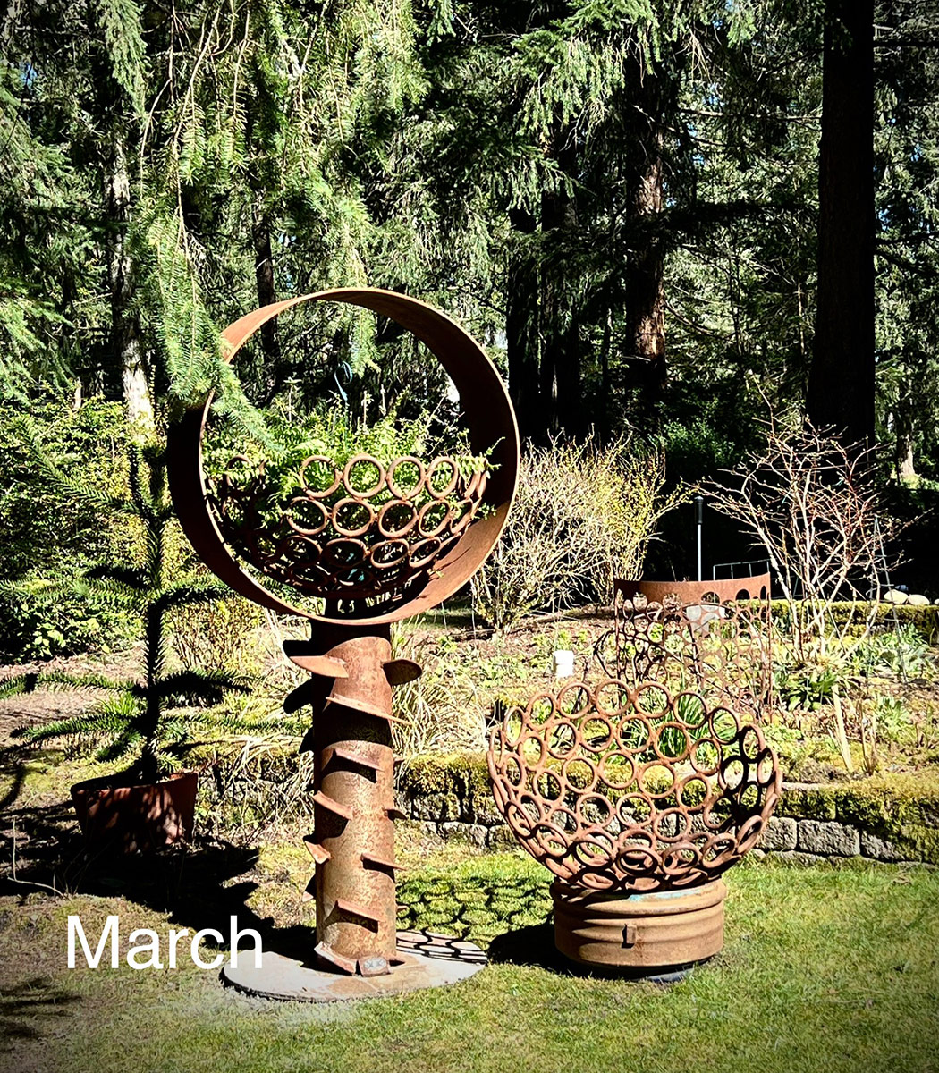 empty metal plant containers in early spring